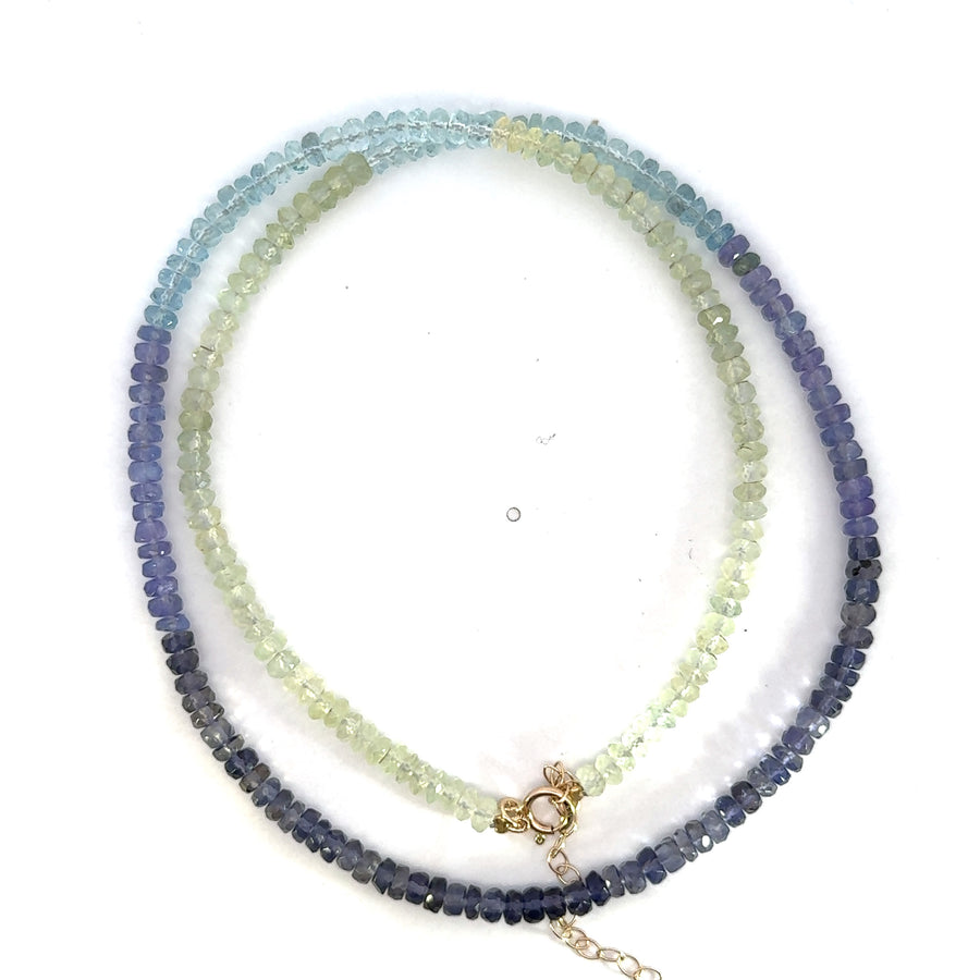 Gradient beaded necklace on white background