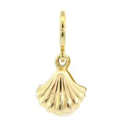 A gold ring featuring a round brilliant-cut diamond solitaire set in a classic four-prong setting, displayed on a white background.
